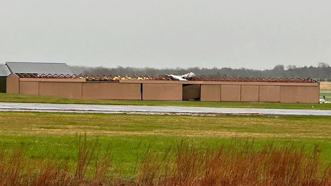 Damage to a hangar is seen at the Rolla Airport in Vichy, Missouri, on April 15, 2023.