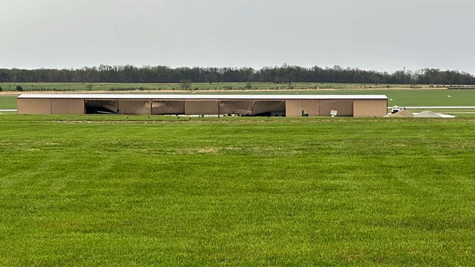 Damage to a hangar is seen at the Rolla Airport in Vichy, Missouri, on April 15, 2023.