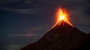 Can one volcano's eruption trigger an eruption at another volcano?