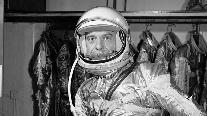 Close-up view of astronaut Alan B. Shepard Jr. in his pressure suit, with helmet opened, for the Mercury-Redstone 3 (MR-3) flight, the first American human spaceflight.