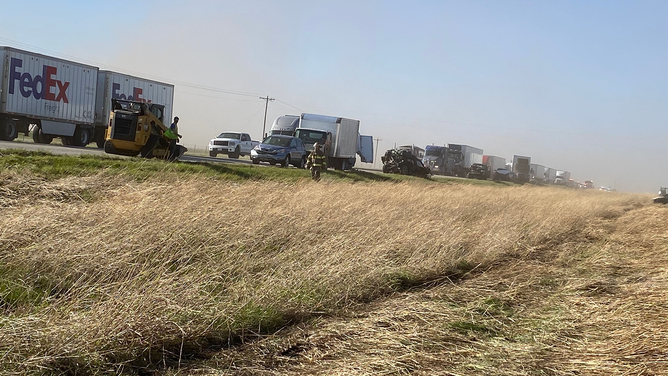A line of vehicles is seen on I-55 in Illinois after a dust storm caused a massive pileup on Monday, May 1, 2023.
