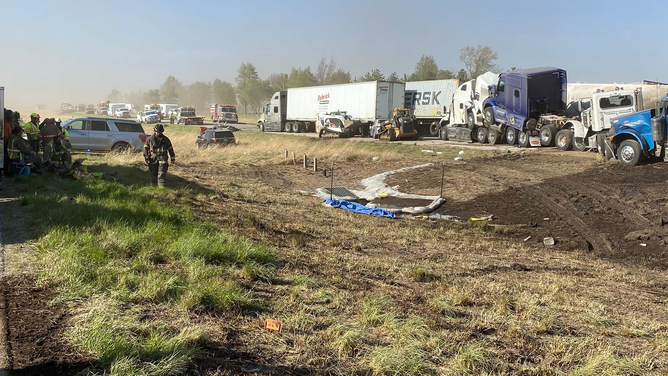 Tractor-trailers are seen in a pile of debris after a crash on I-55 in Illinois during a dust storm on Monday, May 1, 2023.
