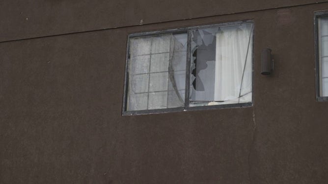 A window broken by hail or damaging winds is seen in Grinnell, Iowa, on Sunday, May 7, 2023.