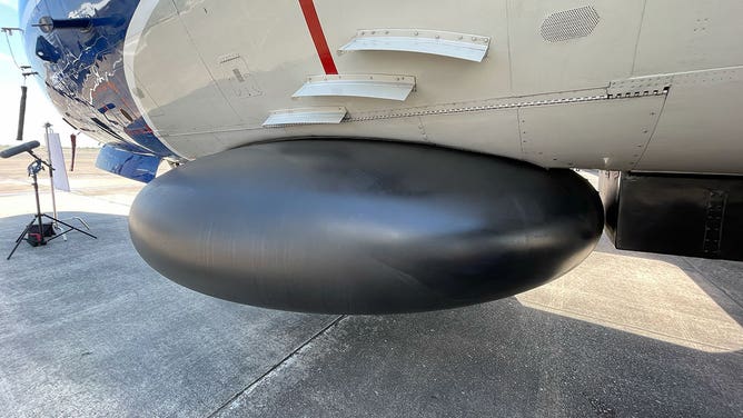 The lower fuselage radar on a WP-3D Orion airplane used by NOAA's Hurricane Hunters is seen during a stop in Houston, Texas, on May 1, 2023.