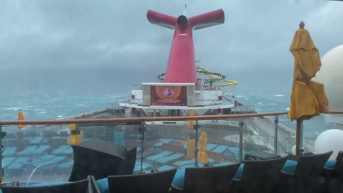 Carnival cruise battered by waves