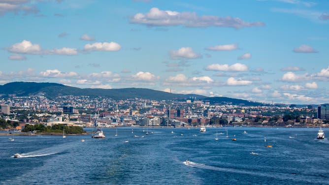 Boats and ferries are seen on in the Oslo fjord along the waterfront of the Norwegian capital on July 25, 2020. 