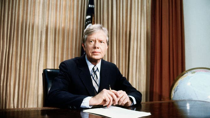 President Jimmy Carter Seated at Desk