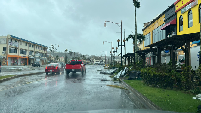 Debris is seen lining the streets of Guam after Typhoon Mawar slammed into the U.S. island territory on Wednesday, May 24, 2023.