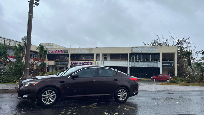 Extensive damage is seen at a shopping center on the U.S. territory of Guam after Typhoon Mawar lashed the island on Wednesday, May 24, 2023.
