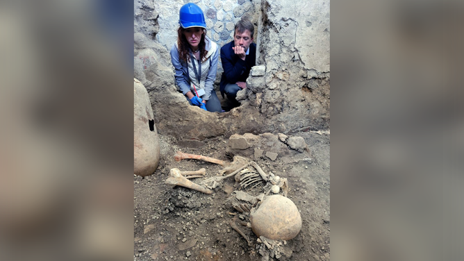 Two skeletons were discovered under a collapsed wall during an excavation at the Pompeii Archaeological Site.