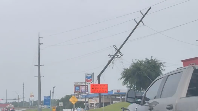 Bent power line in Huntsville, Texas on May 23, 2023.