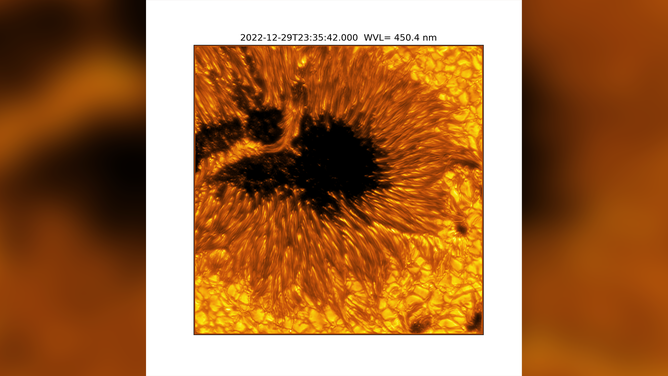 A detailed example of a light bridge crossing a sunspot’s umbra. In this picture, the presence of convection cells surrounding the sunspot is also evident. Hot solar material (plasma) rises in the bright centers of these surrounding 