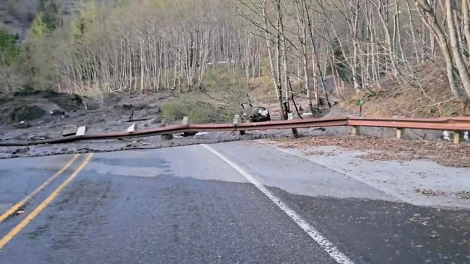 Drivers were stranded overnight near Mount St. Helens in Washington State after a mudslide washed away part of a highway.