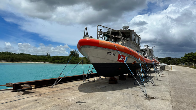 U.S. Coast Guard Station Apra Harbor 45-foot Response Boat Mediums are hauled out and attached to heavy weather tie-downs on May 21, 2023, in advance of Forces Micronesia Sector Guam crews ahead of the arrival of Typhoon Mawar. Tropical-storm-force winds are anticipated to hit Guam and May 23 and continue through early May 25, with heavy rainfall throughout the week.