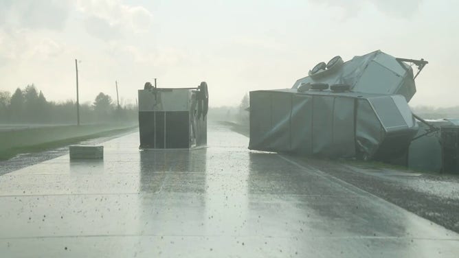 Farm equipment is seen scattered across a road in Grinnell, Iowa, on Sunday, May 7, 2023.