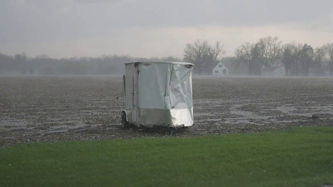 Farm equipment is seen in a field in Grinnell, Iowa, on Sunday, May 7, 2023.