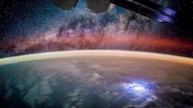 FILE - Crew members on the International Space Station capture a lightning flash over the Pacific Ocean at night.