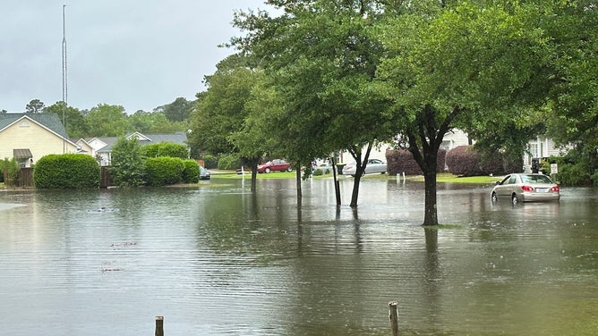 Coastal low brings street flooding to Wilmington NC