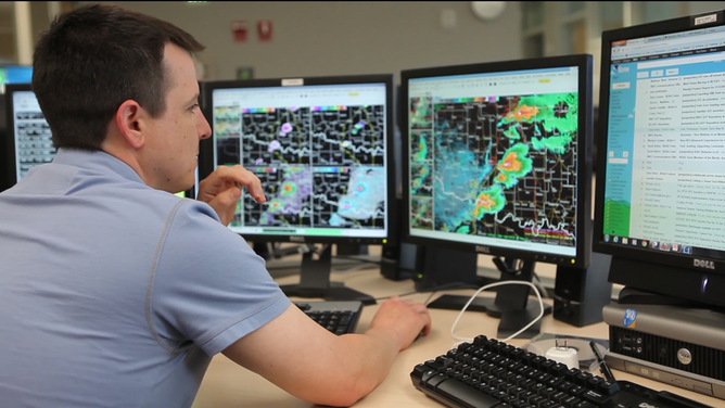 NWS forecasters on May 20, 2013