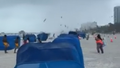Video captures Florida beachgoers running from waterspout that injured 2