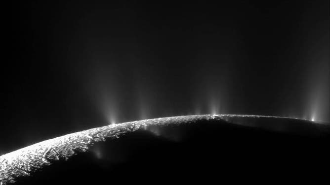 The icy crust at the south pole of Enceladus exhibits large fissures that allow water from the subsurface ocean to spray into space as geysers, forming a plume of icy particles. NASA’s Cassini spacecraft, which captured this imagery in 2009, sampled those particles to reveal the chemicals contained in the ocean.