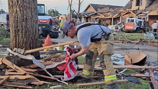 Fire chief saves American flag from tornado debris in Perryton, Texas