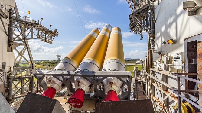 A United Launch Alliance (ULA) Delta IV Heavy rocket is raised vertically at the Space Launch Complex-37 pad in preparation to launch the NROL-68 mission for the National Reconnaissance Office. 