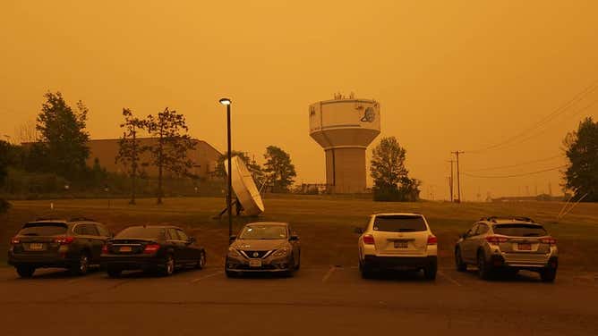 Thick smoke over Binghamton, New York, produces an orange glow at the local National Weather Service office on Wednesday, June 7, 2023.