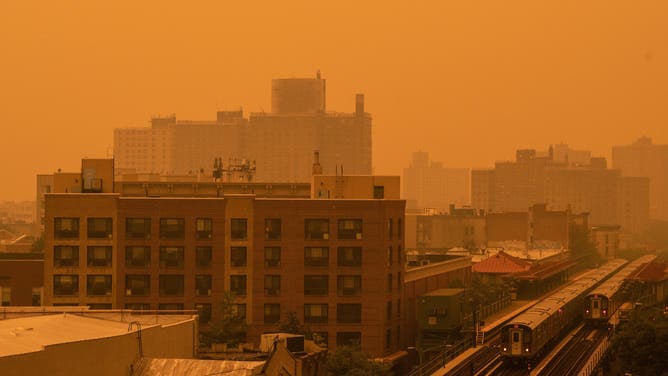 Smoke From Canadian Wildfires Blows South Creating Hazy Conditions On Large Swath Of Eastern U.S. NEW YORK, NEW YORK - JUNE 7: Smoky haze from wildfires in Canada blankets a neighborhood on June 7, 2023 in the Bronx borough of New York City. New York topped the list of most polluted major cities in the world on Tuesday night, as smoke from the fires continues to blanket the East Coast. (Photo by David Dee Delgado/Getty Images)