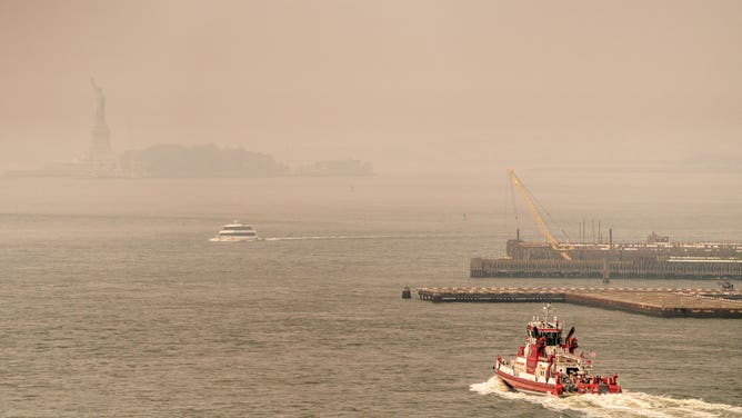 Smoke From Canadian Wildfires Creates Hazy Conditions Over New York City NEW YORK, NEW YORK - JUNE 30: Smoke from wildfires in Canada shrouds the Statue of Liberty on June 30, 2023 in New York City. The eastern U.S. is once again experiencing air quality concerns as smoke from Canadian wildfires billows south with New York City's air quality index reaching 162 in many places. (Photo by David Dee Delgado/Getty Images)