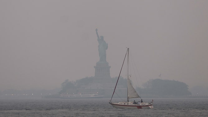 Smoke From Canadian Wildfires Blows South Creating Hazy Conditions On East Coast