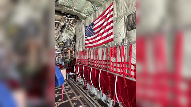 A U.S. flag is seen on a Hurricane Hunter aircraft flying into Invest 91L on Thursday, June 1, 2023.