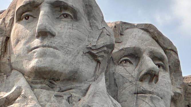 The faces of George Washington and Thomas Jefferson on Mount Rushmore National Memorial.