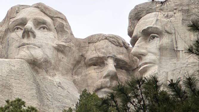 The faces of Thomas Jefferson, Teddy Roosevelt and Abraham Lincoln on Mount Rushmore National Memorial.
