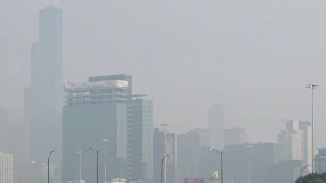 CHICAGO, ILLINOIS - JUNE 28: Wildfire smoke clouds the skyline on June 28, 2023 in Chicago, Illinois. The Chicago area is under an air quality alert as smoke from Canadian wildfires has covered the city for a second straight day.