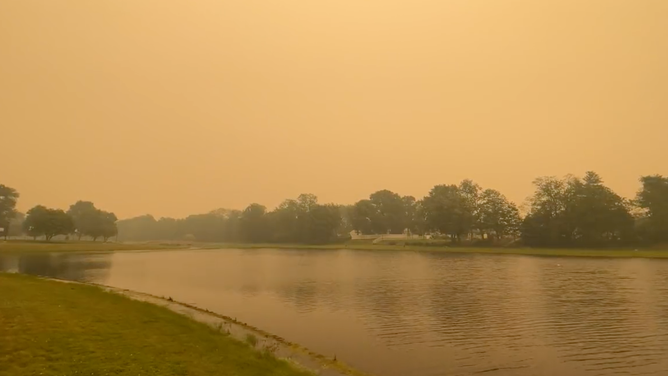 A photo showing the orange sky from wildfire smoke at Spring Lake park in South Plainfield, New Jersey on June 7, 2023.