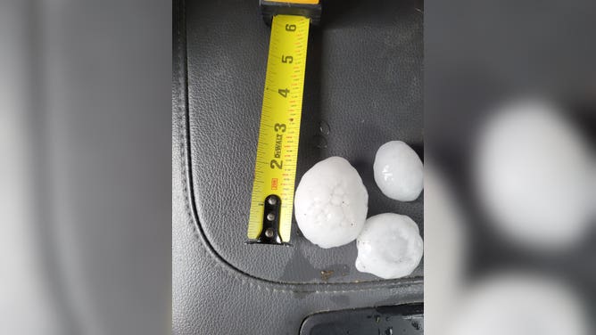 Large hail falls Friday evening in southeast Wyoming