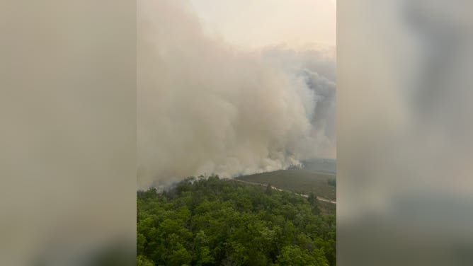 Wildfire Raging In Northern Michigan Almost Fully Contained After