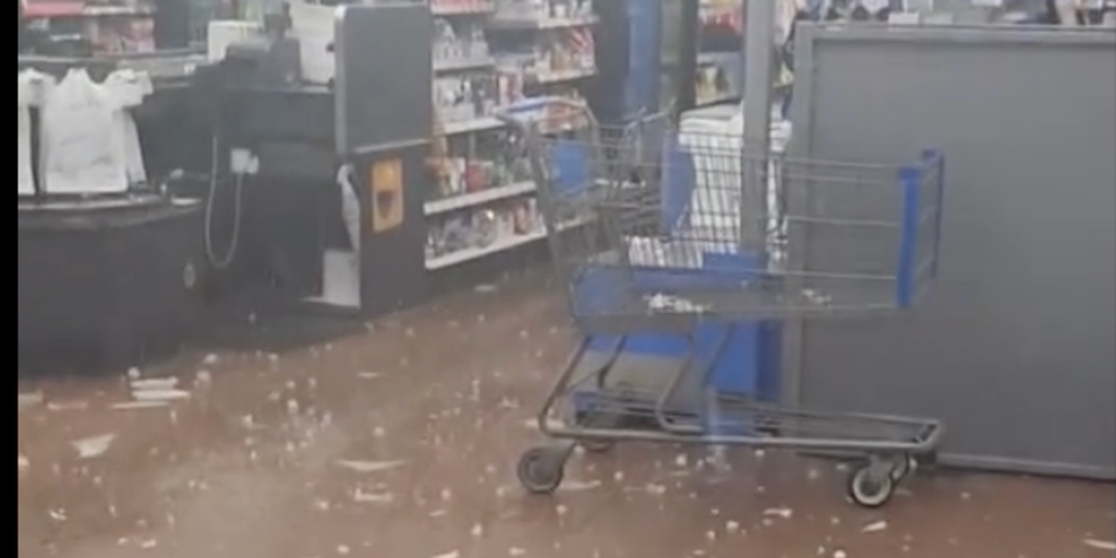 Walmart soaked as tennisballsized hail blasts through roof of