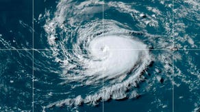 Don becomes hurricane as it heads for cooler waters