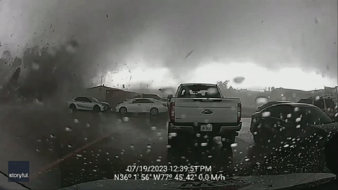 A dash cam captured video of a tornado ripping across the parking lot of a Pfizer facility in Rocky Mount, North Carolina, on July 19, 2023.