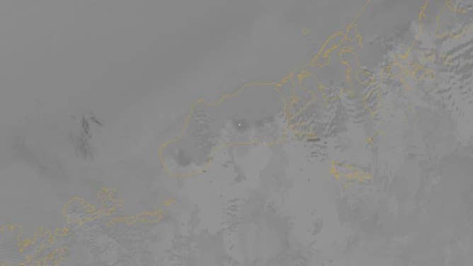 Elevated surface temperatures within the summit crater at Shishaldin Volcano. This is visible as the lighter colored pixel within the darker gray crater in the approximate center of the image. This image is from VIIRS satellite mid-infrared data, captured on July 11, 2023. 