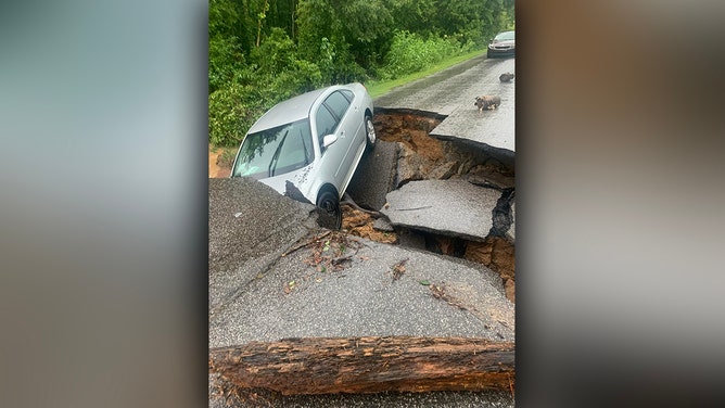 Johnnie Road located in Mayfield, in western Graves County, Kentucky, is closed due to a wash out Wednesday, July 19, 2023.