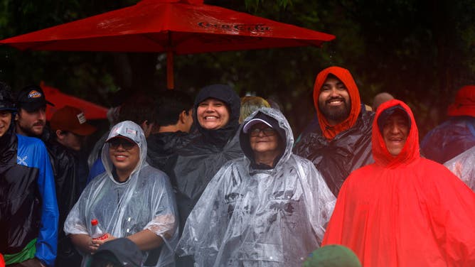 NASCAR fans looks on during a weather delay of the NASCAR Cup Series Grant Park 220 at the Chicago Street Course on July 02, 2023 in Chicago, Illinois.