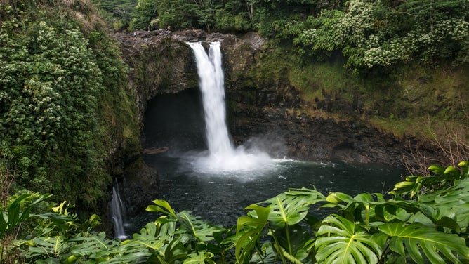 HILO, HI - DECEMBER 14: The scenic and dramatic Rainbow Falls is viewed on December 14, 2016, near Hilo, Hawaii. Hawaii, the largest of all the Hawaiian Islands at 4,000 square miles and growing, features active volcanoes, large cattle ranches, unusual flora and fauna, waterfalls, rainforests, and occasionally, snowcapped mountains. (Photo by George Rose/Getty Images)
