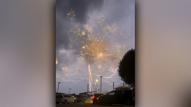 Lightning and fireworks could be seen in Lobelville, Tennessee, on Tuesday evening, July 4, 2023.