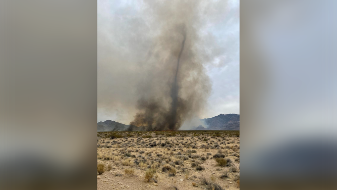 A fire whirl is seen spinning across the desert as the York Fire continues to burn along the California/Nevada border on July 30, 2023.