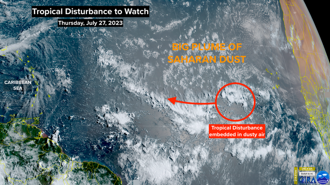 Satellite image of a tropical disturbance in the Atlantic and Saharan dust.