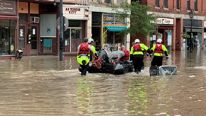 First responders prepare for water rescues in Montpelier, Vermont, after catastrophic and historic flooding on Monday and Tuesday.