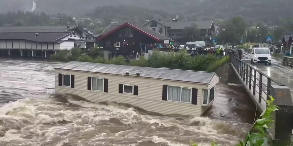 Watch as Norway floodwaters carry away homes, campers and crush them